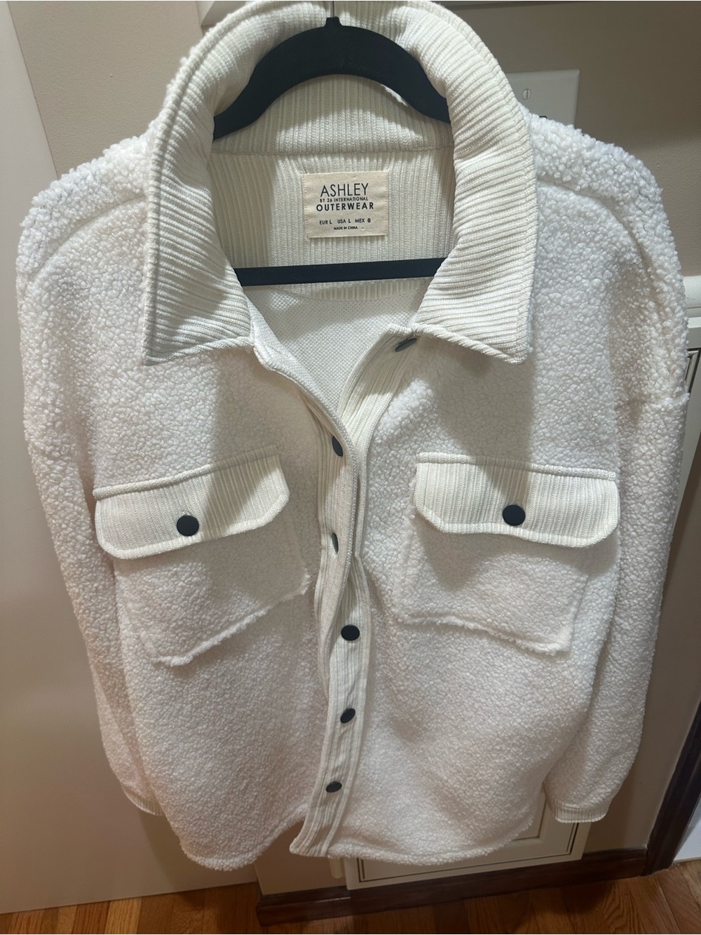 Ashley By 26 International Cream and Black Ribbed Outerwear Top